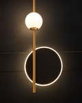 Brass Globe With Halo wall light with opal glass globe and glowing LED ring by Diamond Electrical Industries, Kolkata