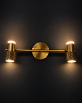 TwinGlow brass wall sconce with two up-down cylinder lights and textured brass shades by Diamond Electrical Industries, Kolkata